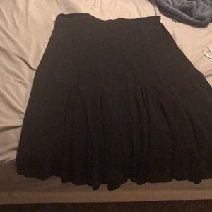 BLACK SKIRT WITH FUN HEMMING AT BOTTOM
